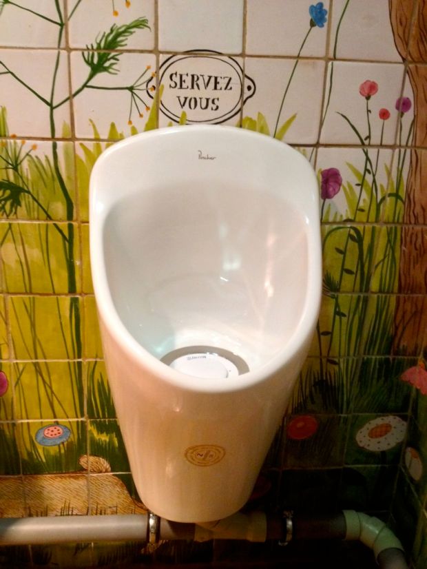 "Serve Yourself" says the caption over this urinal in Strasbourg, France.